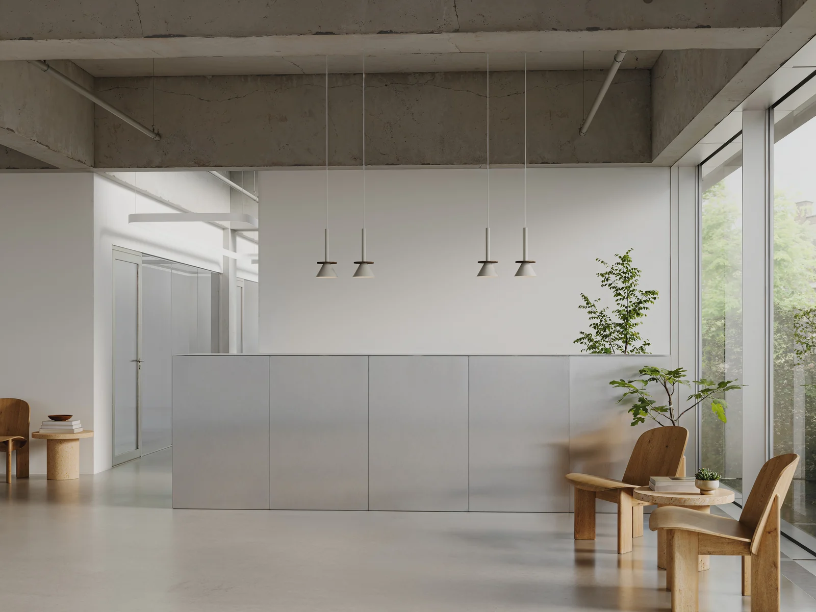 Figure pendants above a minimalist clinic reception desk